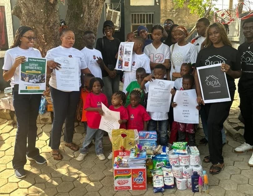 Oloja Foundation team and children